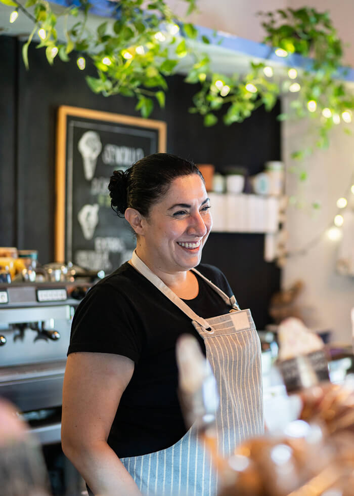 Baker behind counter
