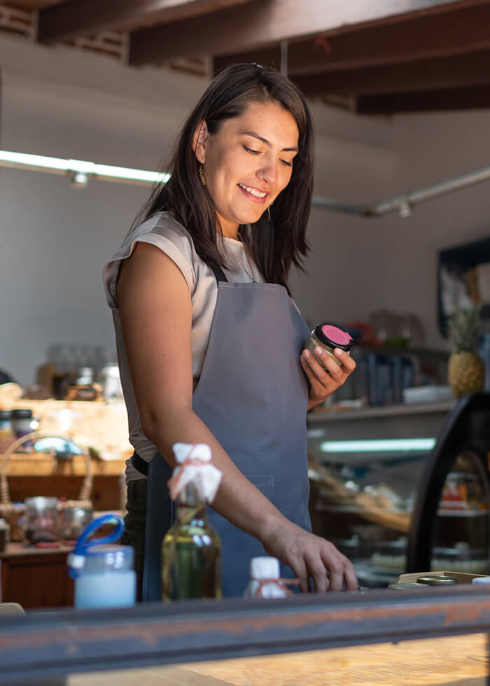 Woman business owner filling order