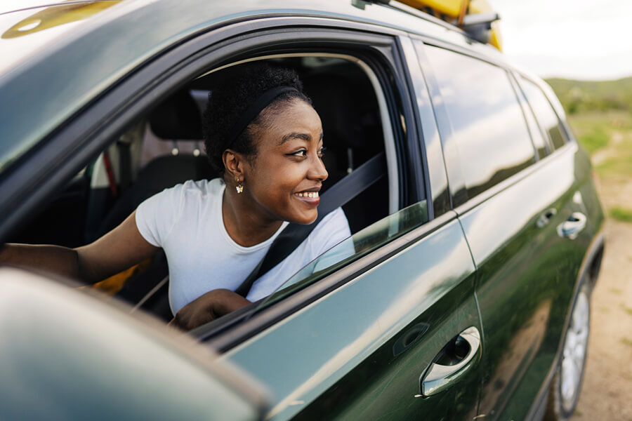 Woman in new car